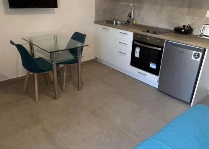 Sunset Realty * Kíni