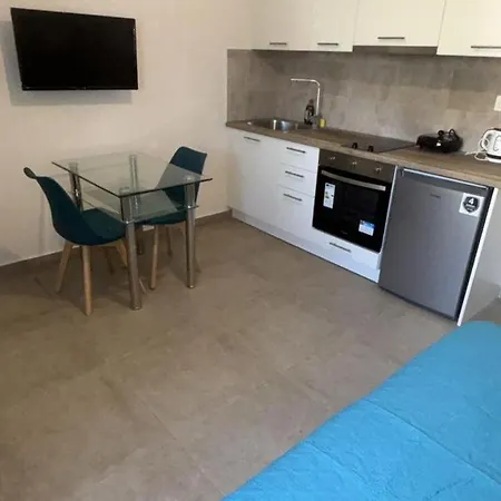 Sunset Realty * Kini